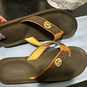 Michael Kors, ladies flip-flops.